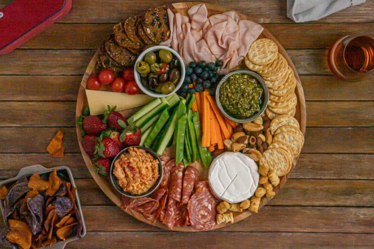 full grazing board with crisps side, drink, speaker