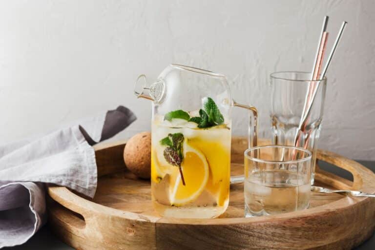 jug of water with lemon and mint