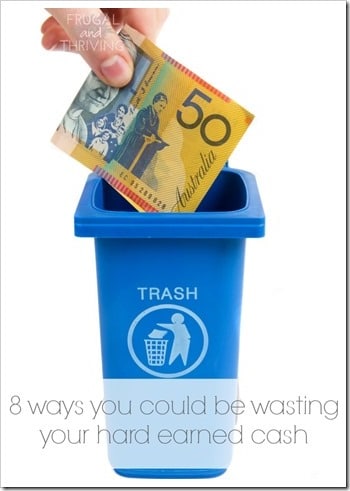 rubbish bin with money