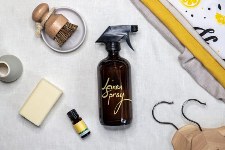 homemade linen spray flat lay with essential oil