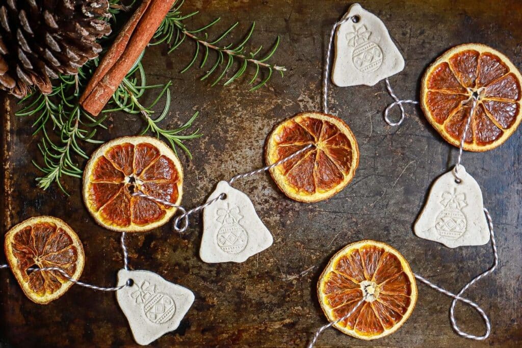 garland made with dried orange slices and homemade salt dough ornaments