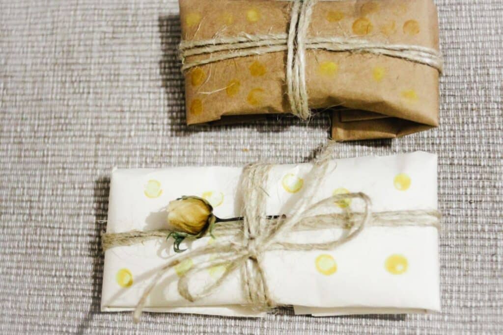 gifts wrapped in recycled paper and jute string