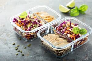 meal prepped food in glass containers