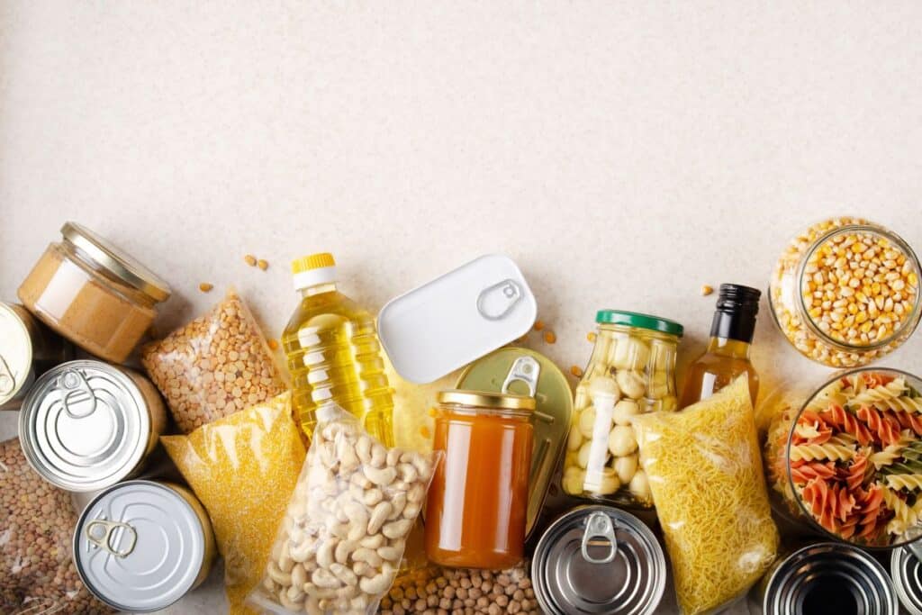 pantry staples, groceries, canned food, bottles of oil