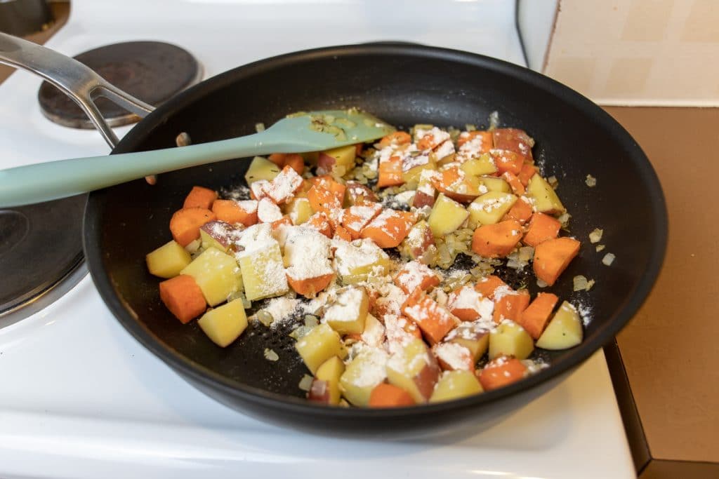 add flour to make roux which forms base of stew