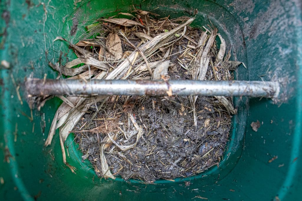 adding dry materials to fix stinky compost