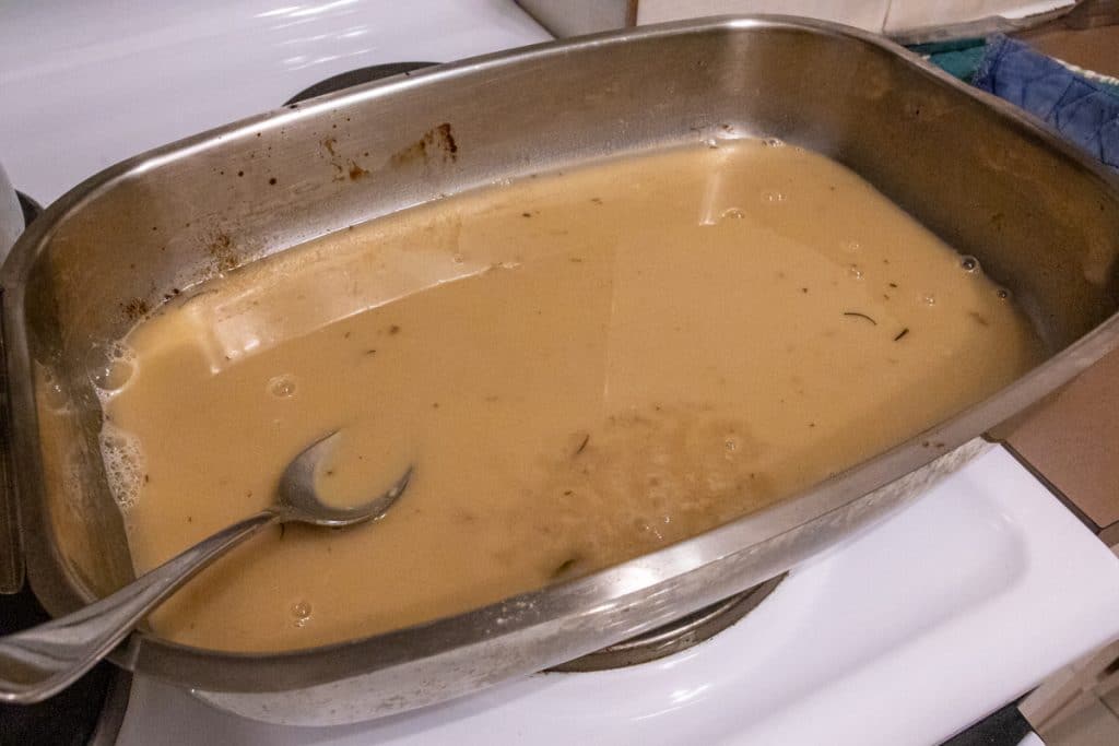 thin gravy simmering to reduce