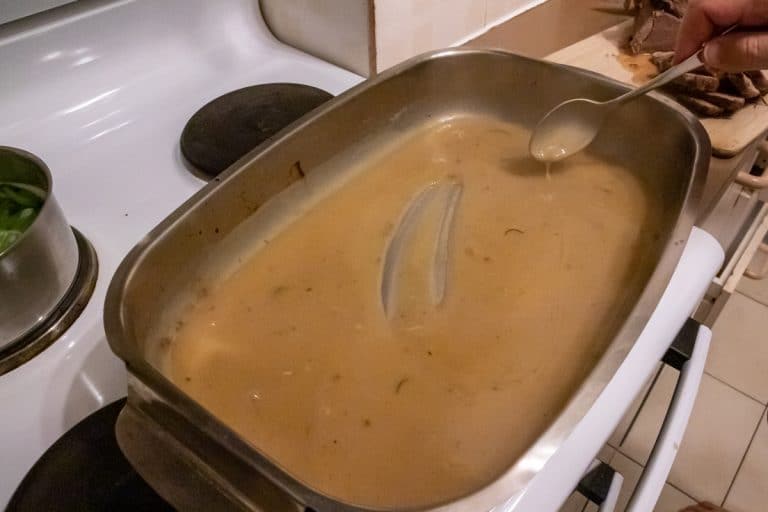 thickened gravy cooking in a pan