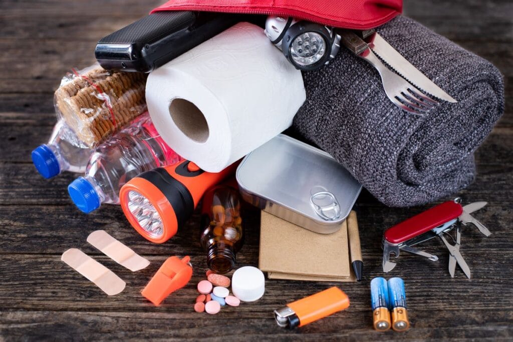 emergency grab and go bag concept photo with ideas for what to put in it
