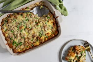 sausage strata in baking dish and on plate