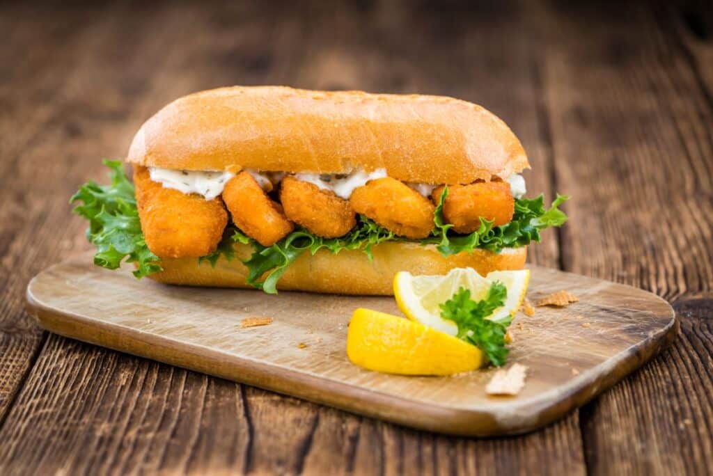 fish sticks on a bread roll with lettuce and mayo homemade freezer to oven food