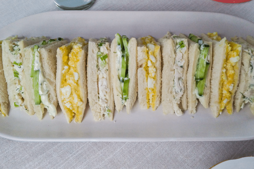 a selection of high tea sandwich trianges