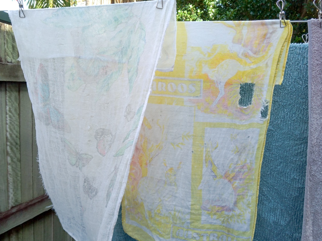 old tea towels drying on line