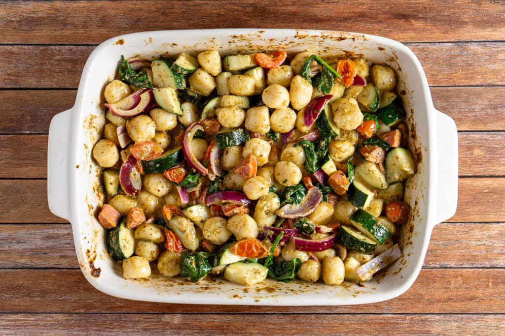 baked pesto gnocchi with chorizo and vegetables top down